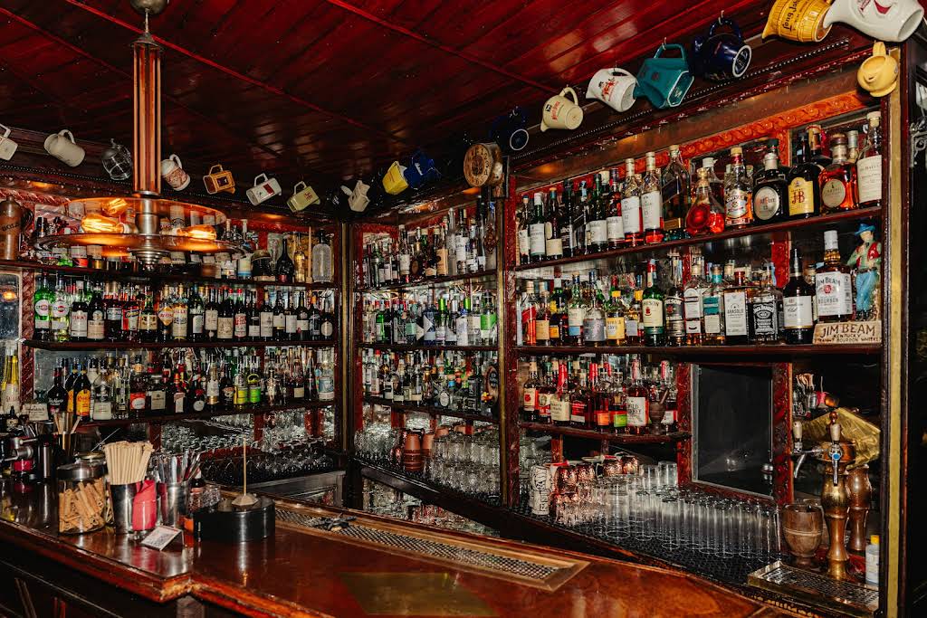 Interior with fireplace and stained glass at Foxtrot.