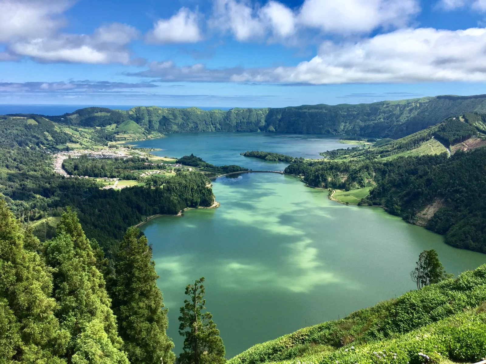 The twin lakes of Sete Cidades in the Azores, one green and one blue.