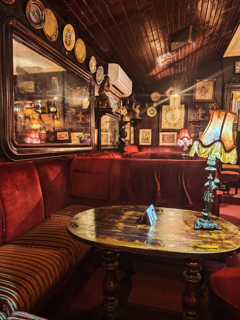 Interior of Procópio bar with soft lighting.