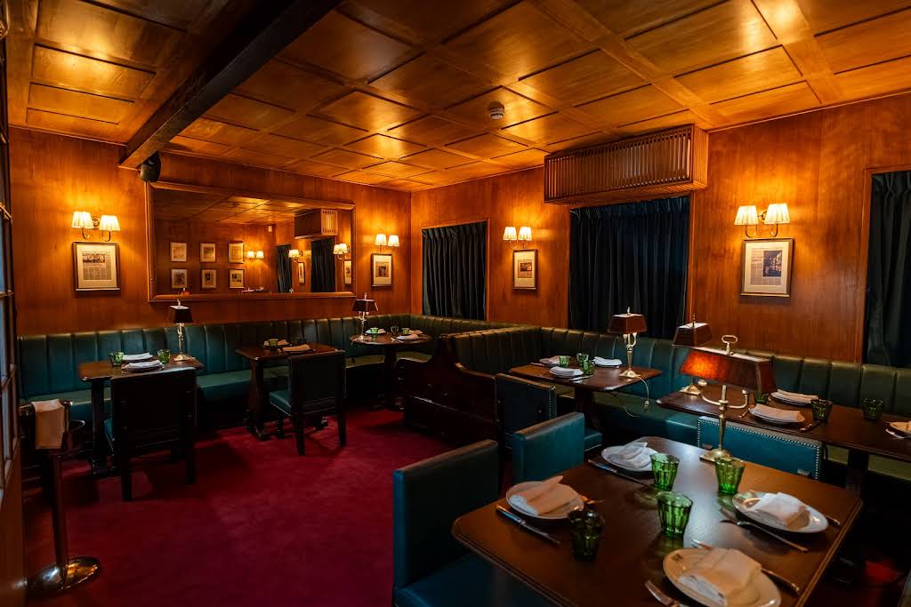 A booth inside the Snob Bar.